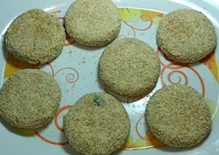 chicken cutlet coated with breadcrumbs